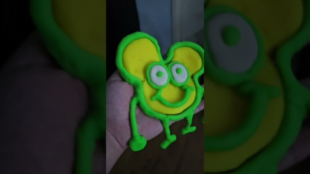 Tossing Play-Doh Gus